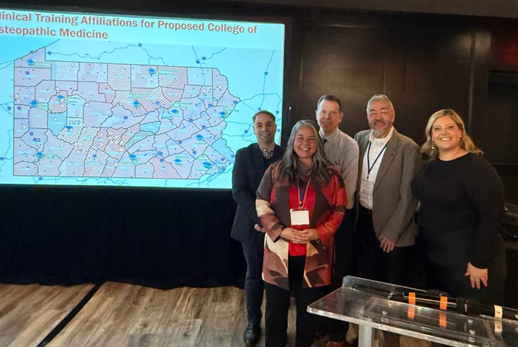 Members of IUP’s proposed college of osteopathic medicine team with Southwest Pennsylvania Commission director 