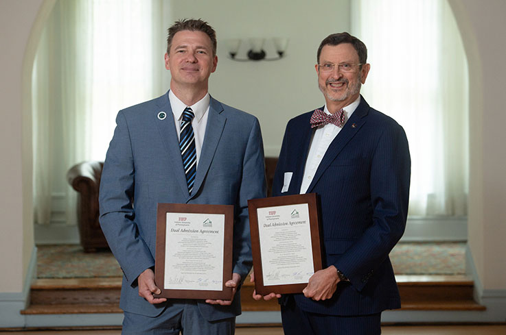 Indiana University of Pennsylvania President Michael Driscoll (right) and Pennsylvania Highlands Community College President Steve Nunez