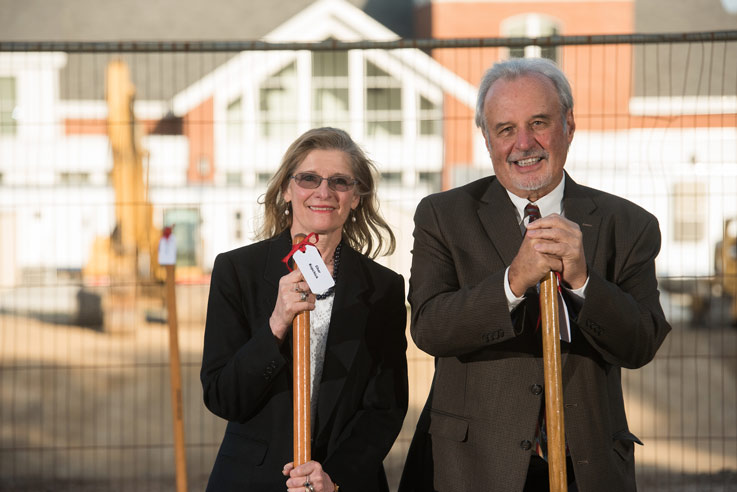 Char and John J. Kopchick hold shovels during the groundbreaking ceremony