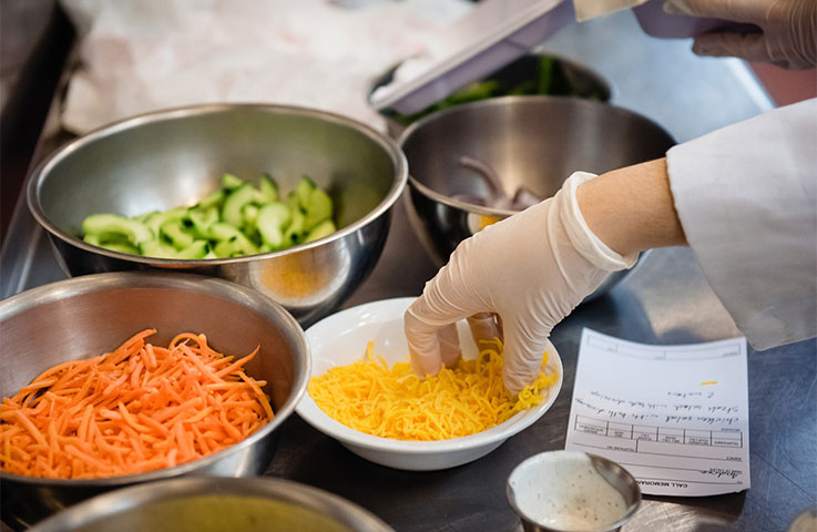 Students prepared lunches at the Allenwood in March