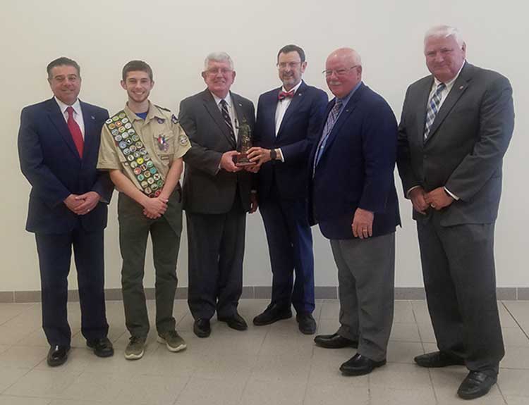 President Driscoll being honored by Boy Scouts, standing with Sam Phillips, Eagle Scout Dominic Ciocca, county Commissioner Rod Ruddock, and Laurel Highlands Council board members Jim Wiley and Bernie Lockard Jr.