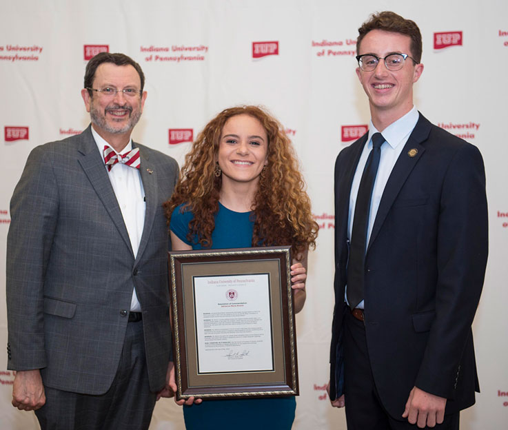 IUP President Michael Driscoll, Adrianna Branin, IUP Council of Trustees member Caleb Kin