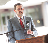 President Driscoll addresses the crowd at the hotel groundbreaking ceremony