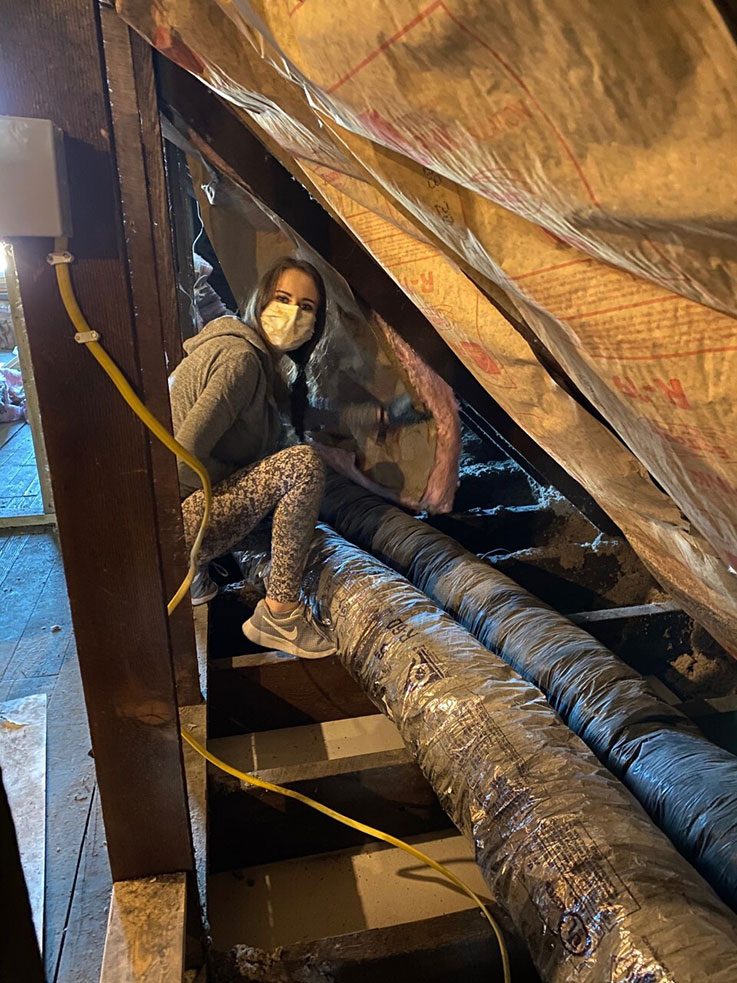 A student from IUP's chapter of Habitat for Humanity worked on a house's interior. A student from IUP's chapter of Habitat for Humanity worked on a house's interior.
