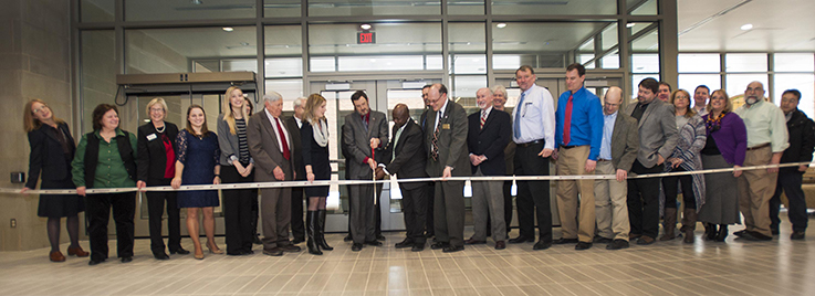 Chairpersons from departments in Humanities and Social Sciences cut ribbon