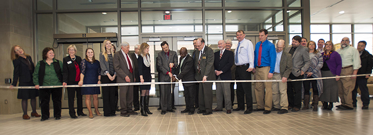Chairpersons from departments in Humanities and Social Sciences cut ribbon