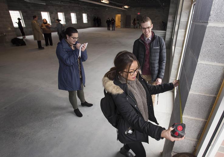 Student in front measuring – Jessica Lin, from Wexford; student in background writing -- Erin Stiffler, from Altoona; male student on far right, Quinton Shoulders, New Baltimore, MI.
