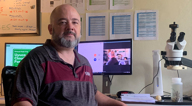 Joe Townsend in his Honduran home office