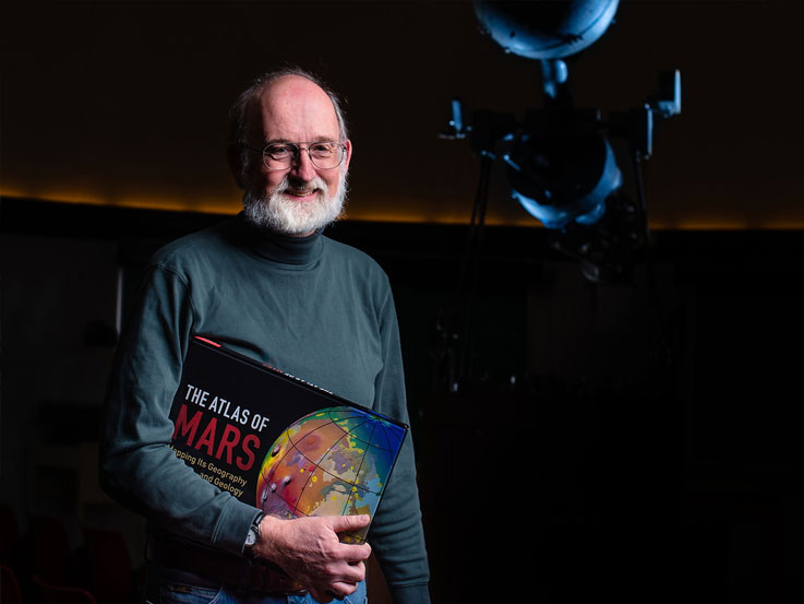 Geoscience associate professor Ken Coles cowrote “The Atlas of Mars,” published in 2019. Geoscience associate professor Ken Coles cowrote “The Atlas of Mars,” published in 2019.