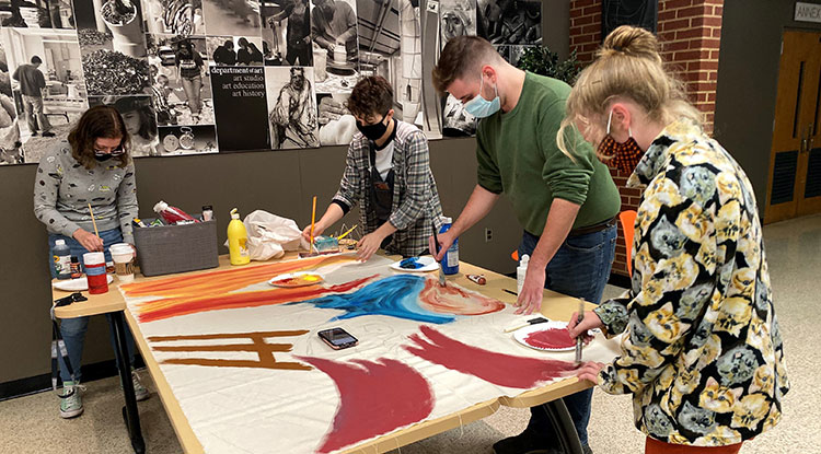 National Art Education Association members worked on their Homecoming 2020 banner. From left: Mary Crouse, Jen Freno, Davey Beyer, and Sydney Huston. National Art Education Association members worked on their Homecoming 2020 banner. From left: Mary Crouse, Jen Freno, Davey Beyer, and Sydney Huston.