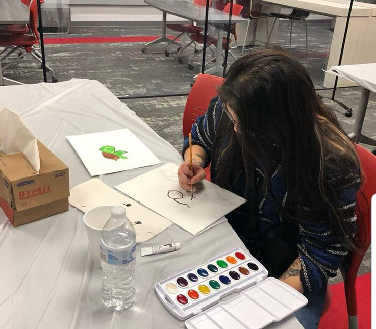 Jess Trout during a paint night with members of Queer Colors and the Black Student League.