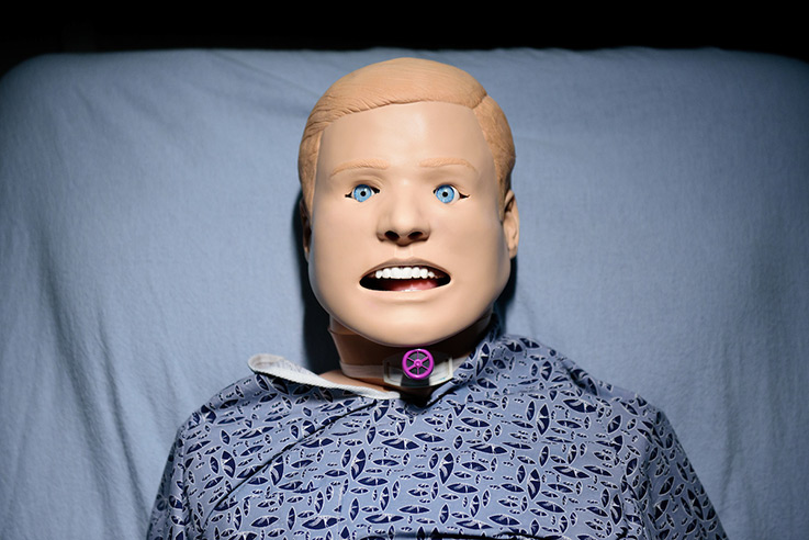 Kevin is outfitted with a tracheostomy, dentures, a stomach, and lungs. He can experience aspiration during a “swallow.” 