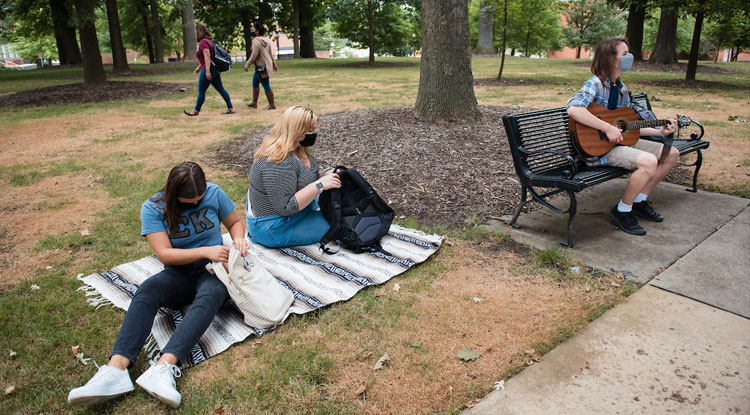 Students in the Oak Grove with masks on