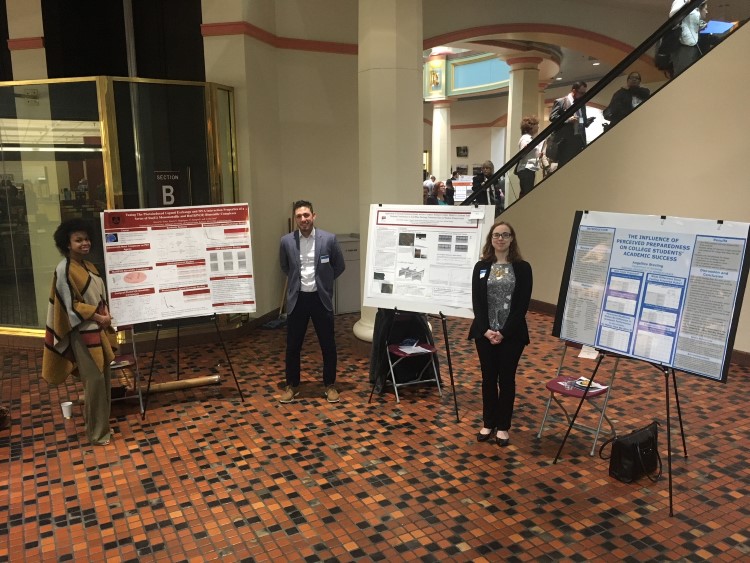 Angellica Sterling, Aaron Seidel, and Kiera Estes with their posters at the Undergraduate at the Capitol competition