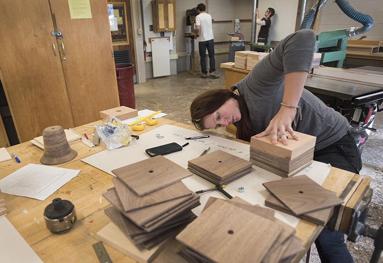 Jenn Milkey working on part of the Governor's Award for the Arts