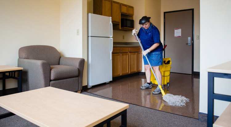 Cleaning staff cleaning residence hall Cleaning staff cleaning residence hall