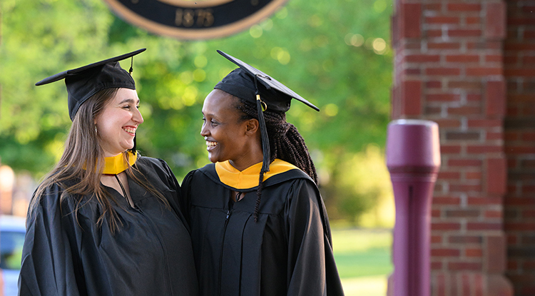 Students in cap and gown at commencement 