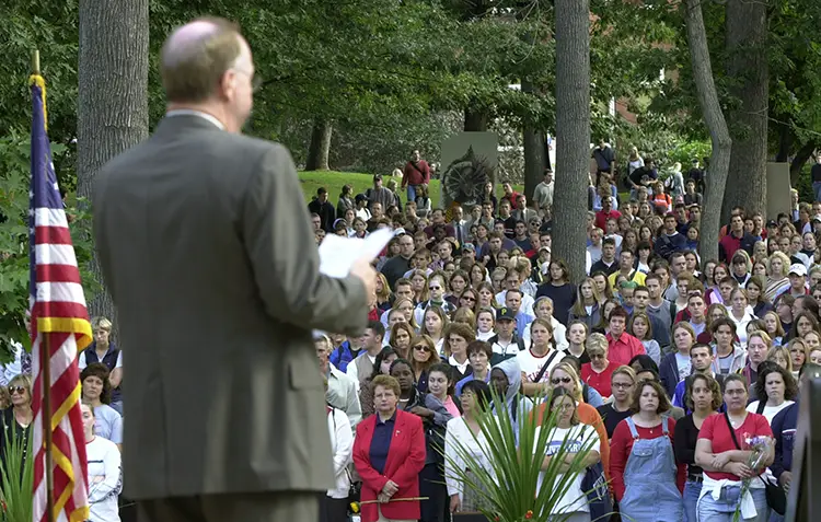 President Lawrence Pettit spoke during a memorial service in the Oak Grove three days after the 9/11 attacks.