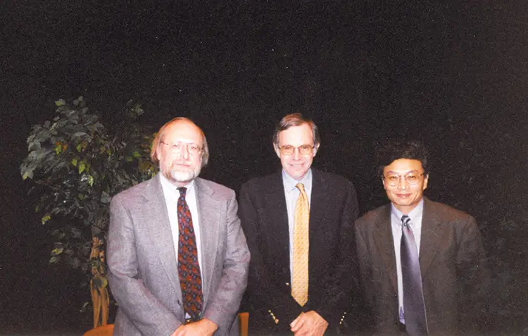 Guest lecturer Eric Foner, center, with History Department chair Gary Bailey and faculty member Xi Wang in 2001