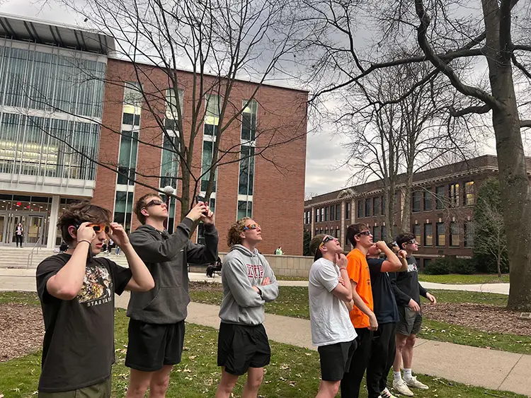 Students watched the April 8, 2024, solar eclipse from the Oak Grove.