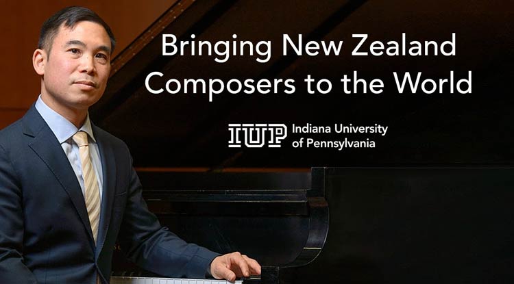 Henry Wong Doe in a suit and tie sitting at a piano facing the camera.  The words Bringing New Zealand Composers to the World sits in white text above the IUP logo