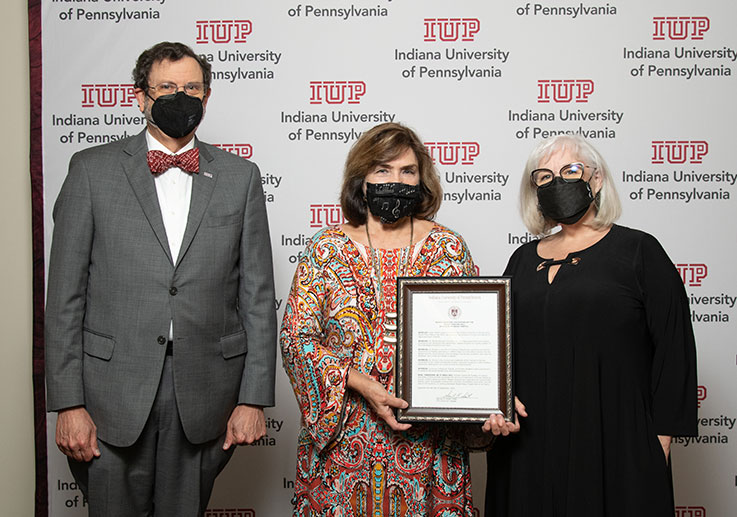 From left, IUP President Michael Driscoll; Susan Wheatley, retired faculty member who collaborated with Mantel on the Festival of Women Composers; music faculty member Mary Logan-Hastings.