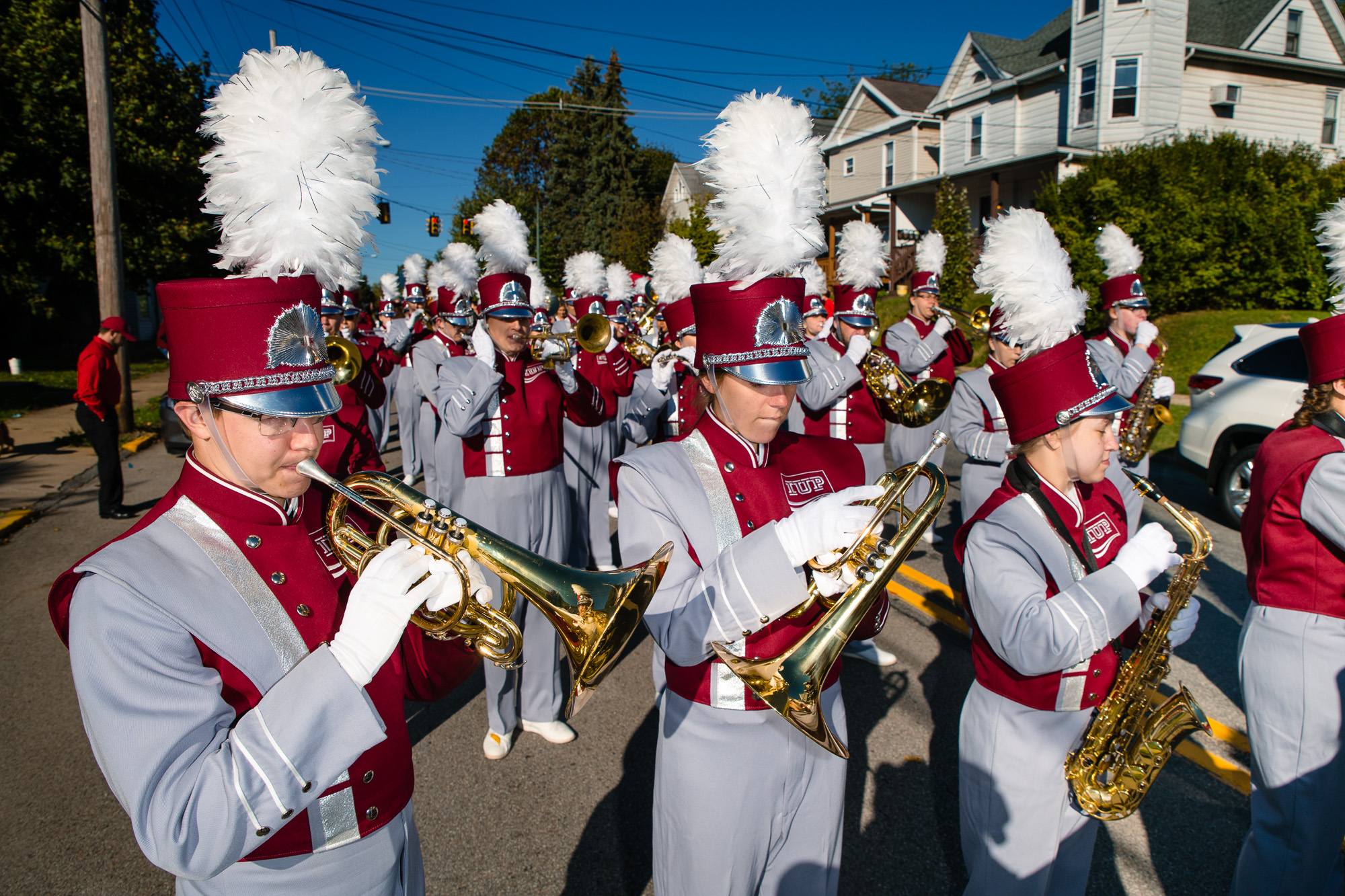 The IUP marching band warms up before the start of the 2019 homecoming parade.