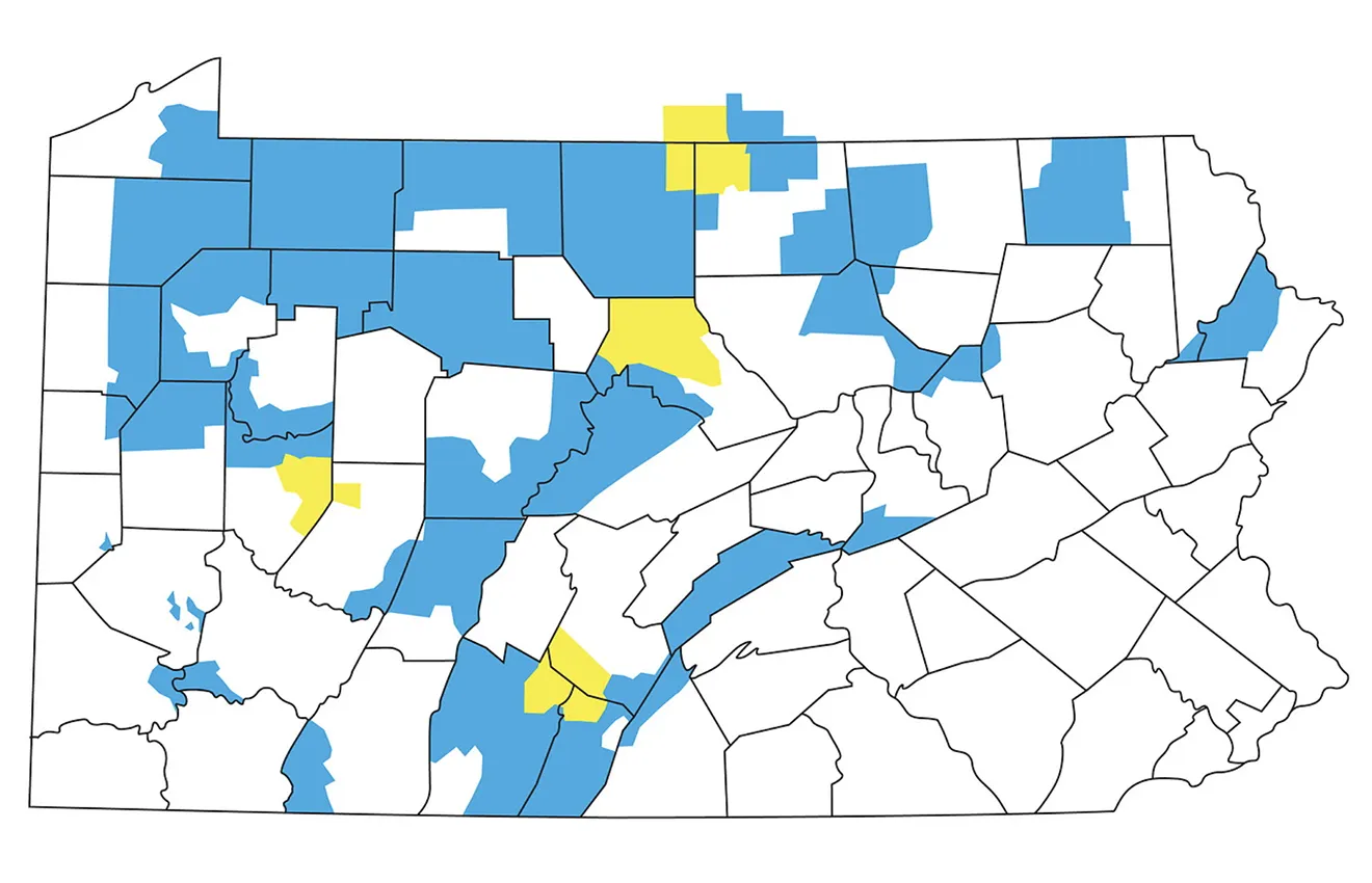 a county map of Pennsylvania showing blue and yellow areas of primary care physician shortages