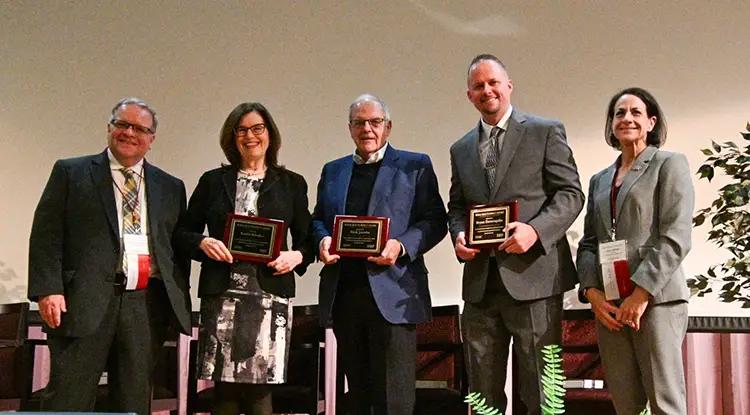 From left, IRMC Chief Operating Officer and Chief Human Resources Officer for the Pennsylvania Mountains Care Network and co-emcee for the event Dr. Jim Kinneer, Dr. Karin Rhodes, Nick Jacobs, Dr. Bryan Doverspike, and event co-emcee IUP Provost and Vice President for Academic Affairs Dr. Lara Luetkehans (Dr. George Garrow is absent from photo).