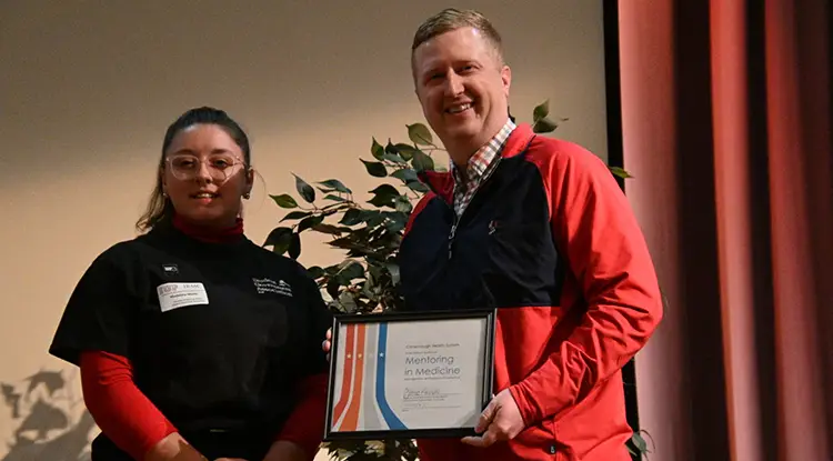 IUP student Madeline Metts; Conemaugh Memorial Medical Center Emergency Medicine Physician and Mentoring in Medicine Program Director Dr. Alex Pozun