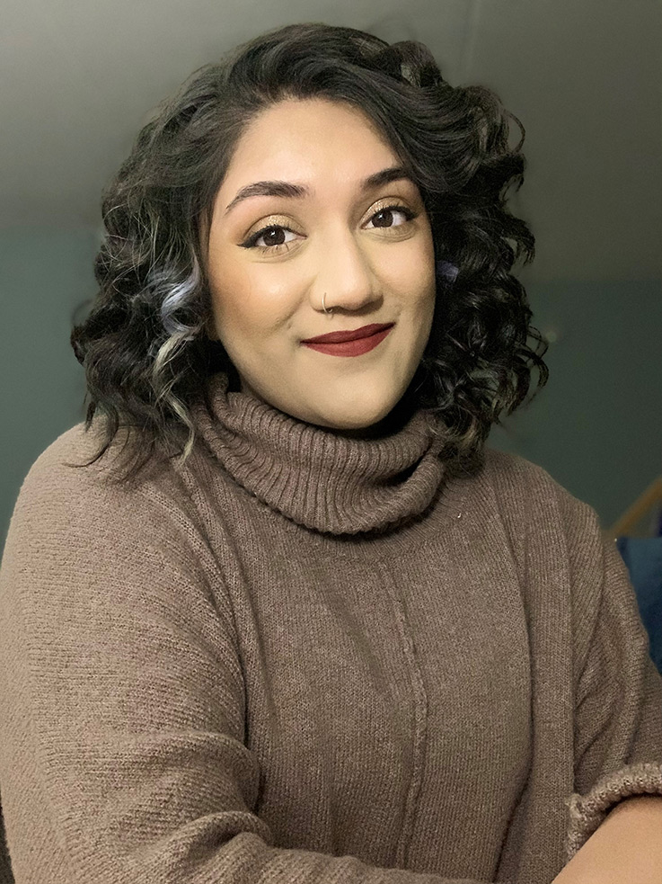 Indoor, head-and-shoulders portrait of Nabiha Islam