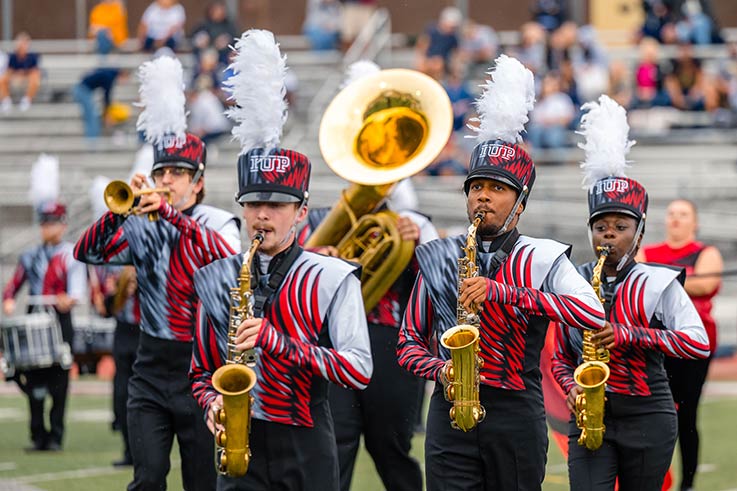 The IUP marching band performs at halftime during a football game against Clarion on September 28, 2024.