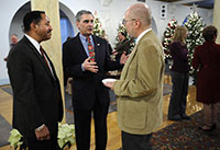 Talking at the December 3 Holiday Open House were, from left, IUP President Tony Atwater, PASSHE Chancellor John Cavanaugh, and chemistry professor John Ford.