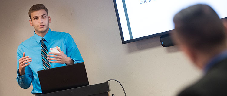 A student speaking in an MEd in Education classroom