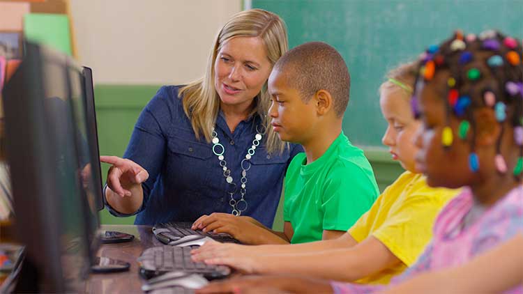 Teacher talking with children