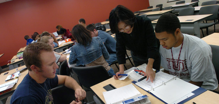 students working with a professor at Punxsutawney campus