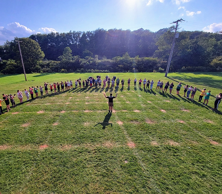 people standing in a field