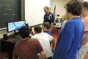 Students with simulator in a classroom