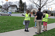 Class conducting a walkability assessment