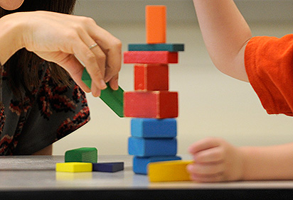 A child's hands with blocks