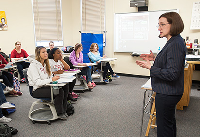 Professor Annah Hill teaches a class