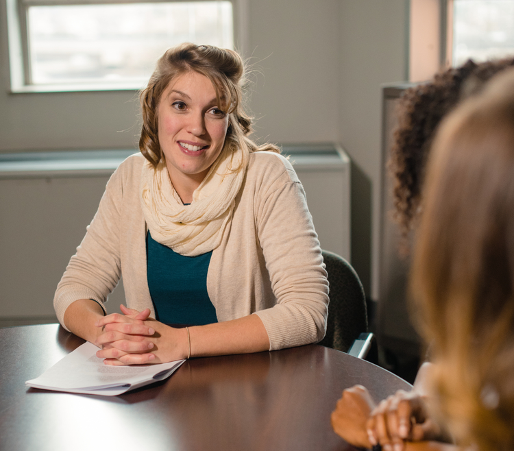 Faculty Member Meets with Students