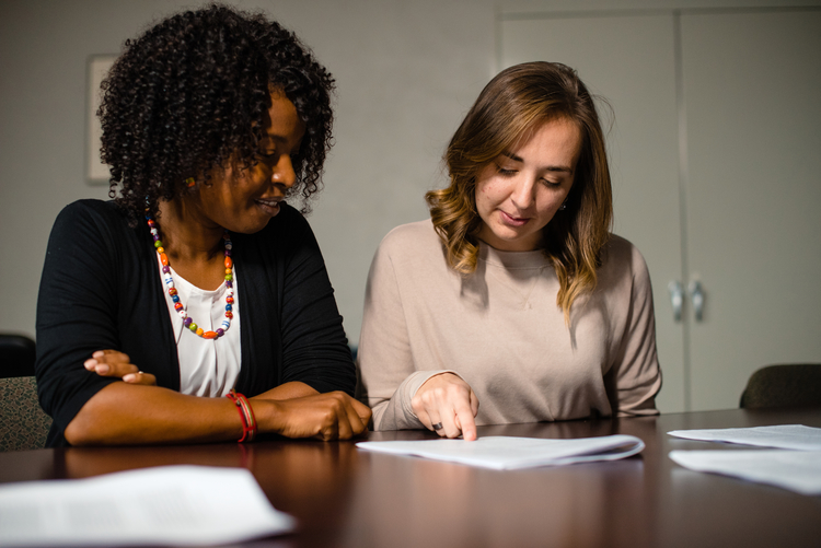 Student in the SLP undergrad program discuss a project