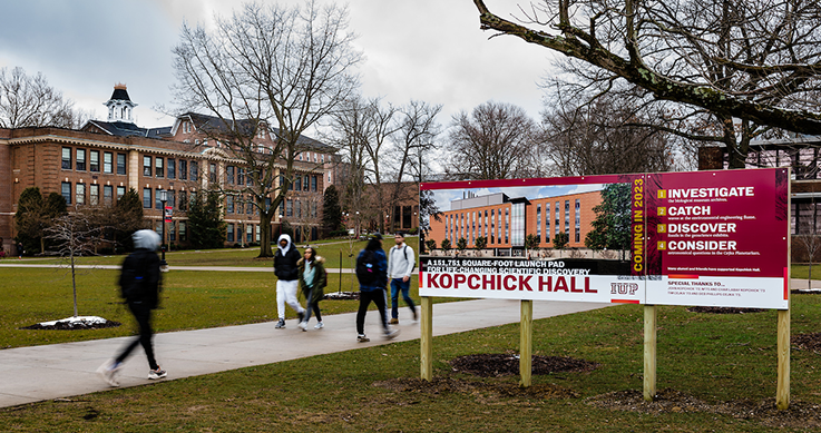 Sign that includes building information about Kopchick Hall 