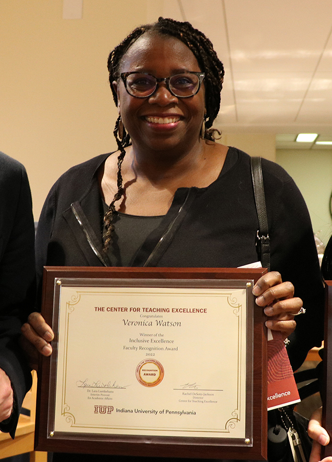 Veronica Watson with award