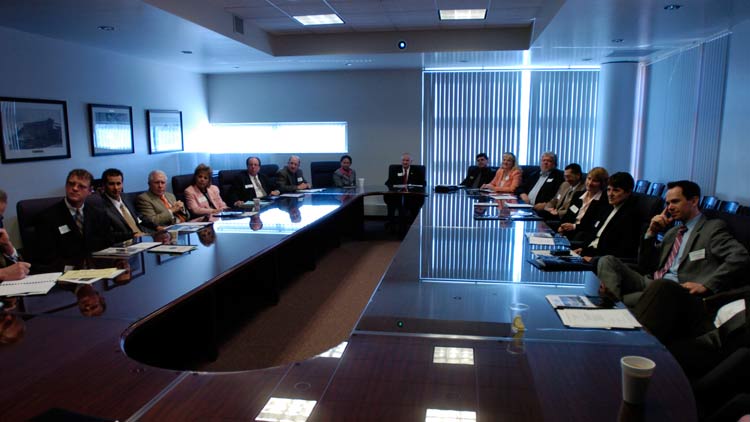 Business Group around a conference table Business Group around a conference table