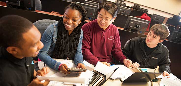 Accounting students work on a group project