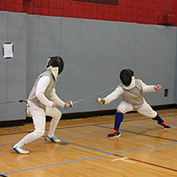 Joe Yaure in a fencing duel.