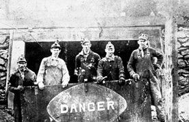 Miners with Danger sign