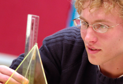 A student measures a shape